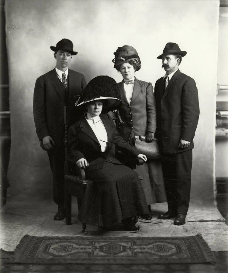 Two couples are pictured in a group photo. Anna Langley is in the photo as part of one of the couples.