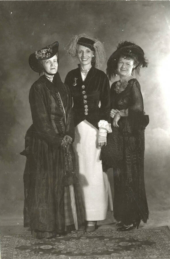 Formal portrait of ladies in fashion dresses at the North Idaho Press Jubilee.