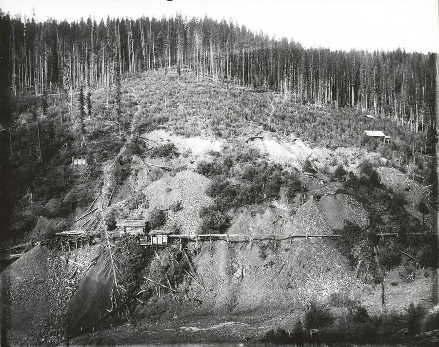 North side, Coeur d'Alene Mining District (Murray area). A flume can be seen in the photograph.