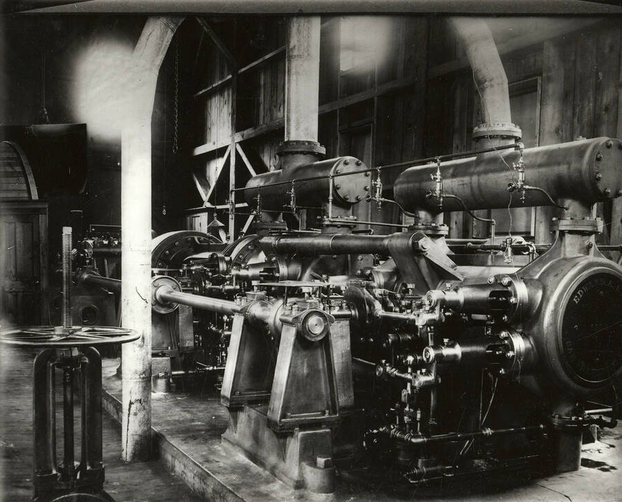 Interior view of the morning mine engine room showing the large machinery.