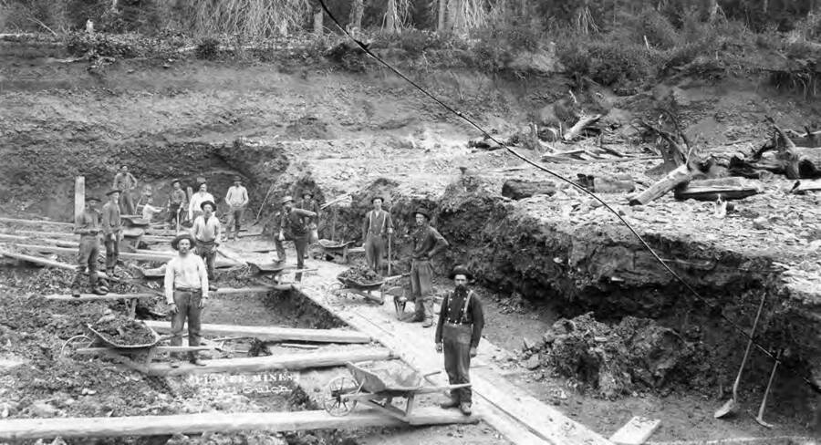 Image shows men working at a placer mine at Trail Gulch, Idaho in 1890.