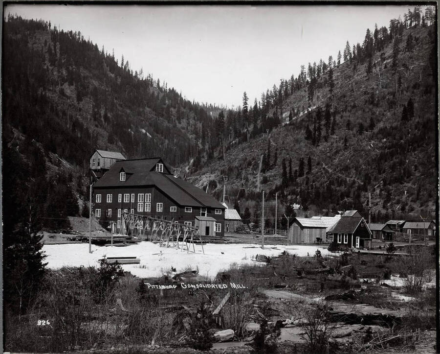 A long view of the Pittsburg Consolidated Mill in Wallace, Idaho, in 9 Mile Canyon.