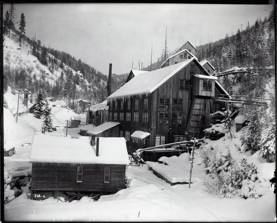 View of mill covered in snow