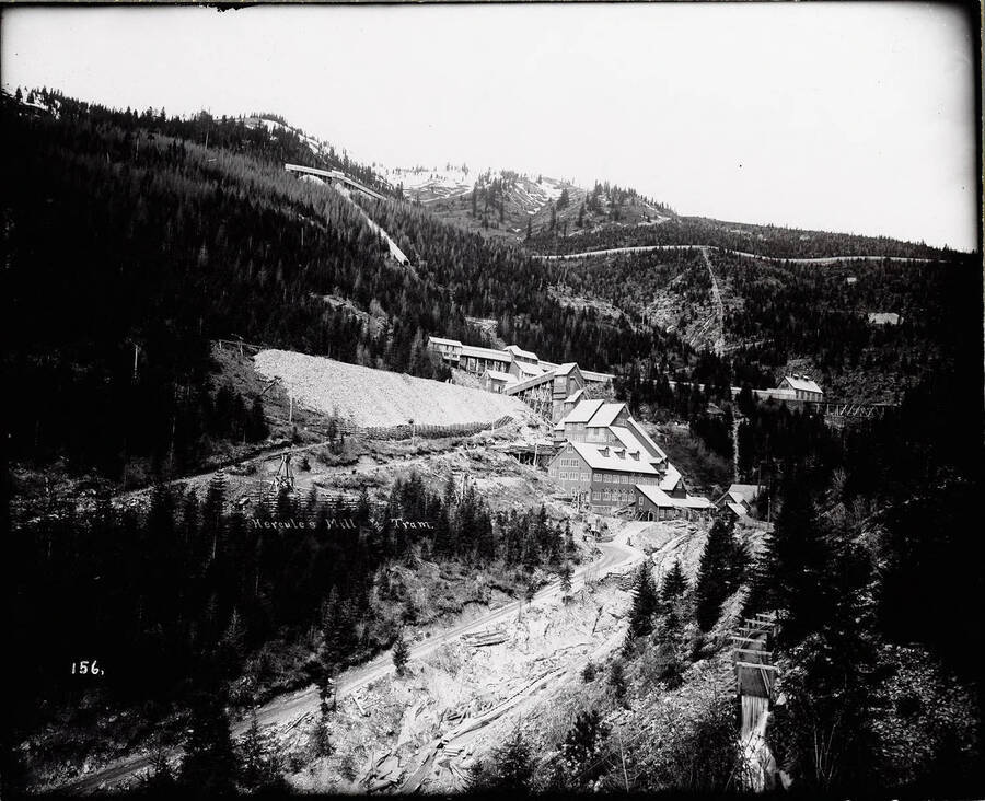 View of the Hercules Mill. A possible flume can be seen at the bottom right-hand corner of the photograph; Caption on front: "Hercules Mill and Tram".