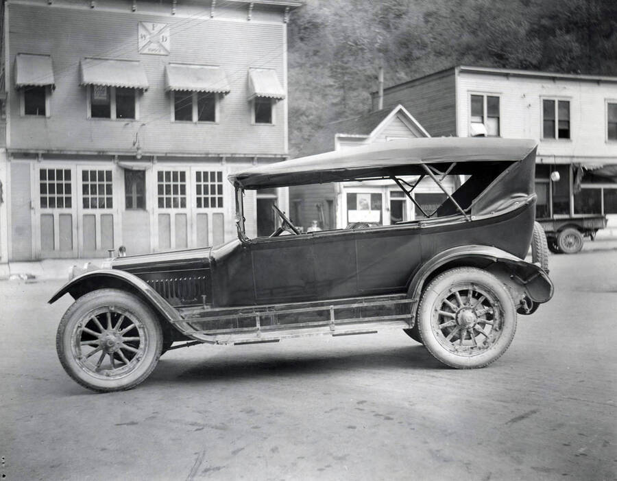 Lee Cunningham's jitney (taxi) after being struck by motorcycle in Wallace, Idaho, 1922.