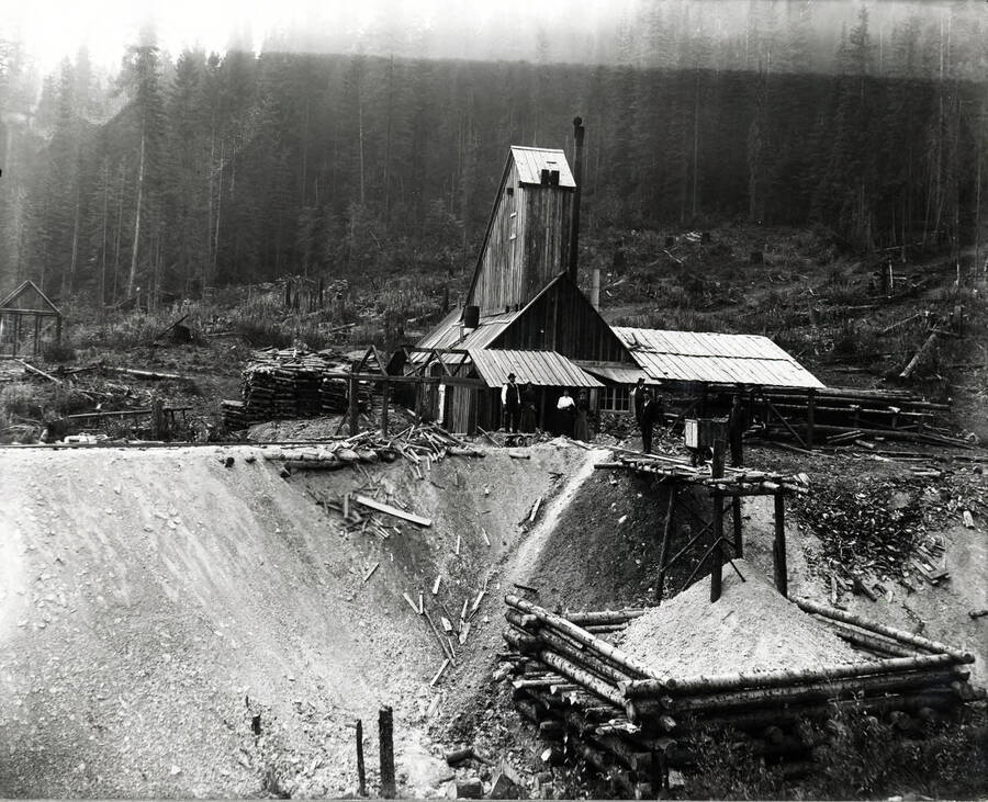 View of people outside the Tarbox mine in Saltese, Montana 1906.