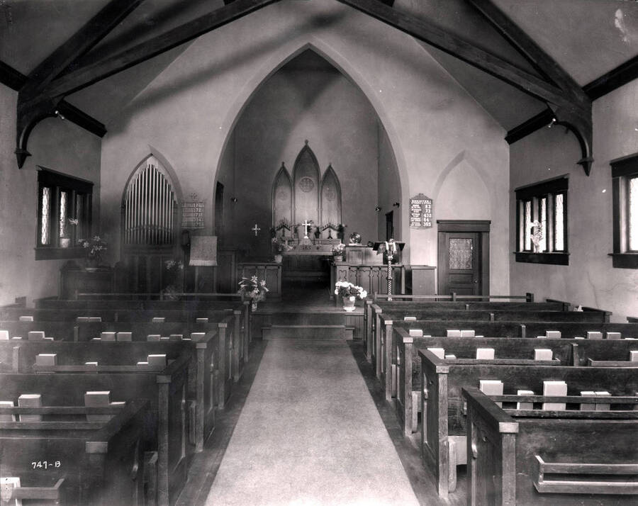 Interior view of the alter and pews in Holy Trinity Episcopal Church, Wallace, Idaho, 1925.