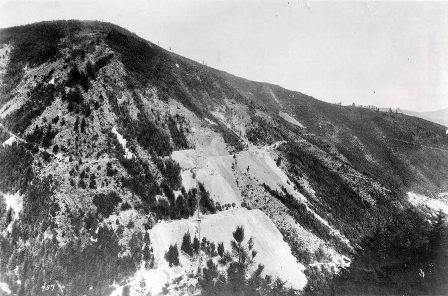 Image shows Bunker Hill and Sullivan Mine in the beginning stages of it being built on the hillside, Wardner, Idaho, 1925.