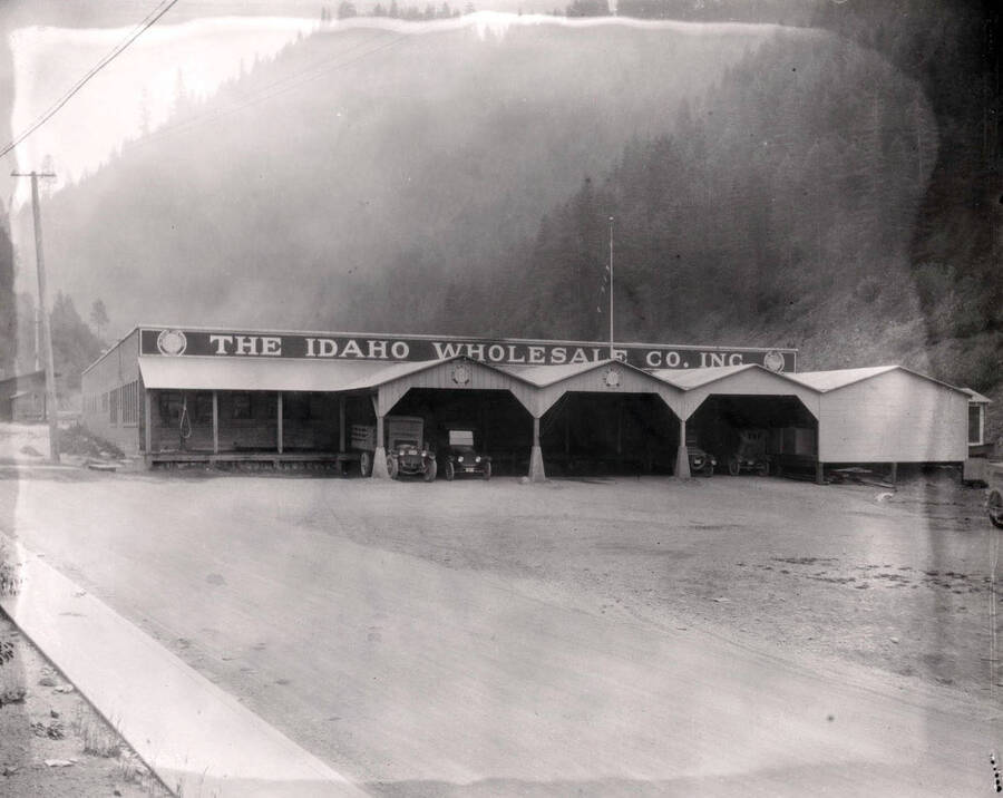 Exterior view of The Idaho Wholesale Co. Inc., a part of the Morrow Retail Stores, located in Wallace, Idaho, 1925.