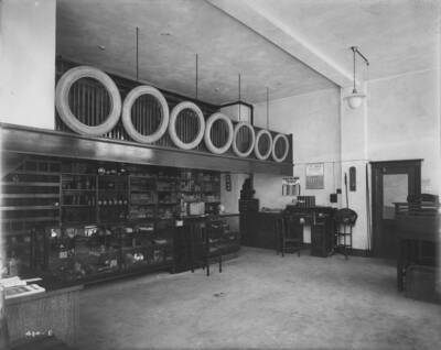 Interior of Hendricks Garage shows various supplies for automobiles.