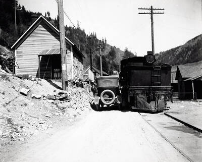 View of wagon road and railroad, wagon road and railroad at Gem, taken April 29, 1919