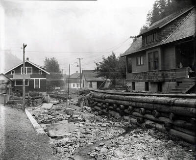 Johnny Nordquist retaining wall at house, August 28, 1919.