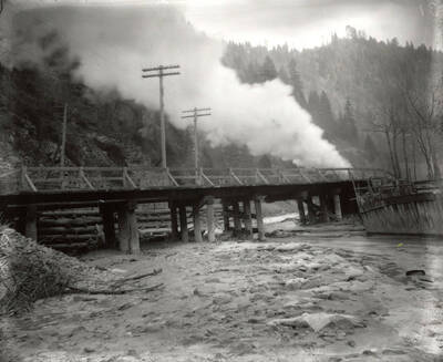 The bridge over the Coeur d'Alene River in Wallace, Idaho. Taken for H.L. Day.