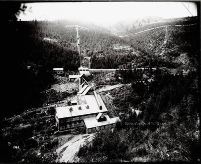Caption on front reads, "Hercules Mill and Tram," however, this may be the Hercules Mine. The Hercules Mill, no. 4 level was in Burke, Idaho and was connected with other operating levels by a series of trams