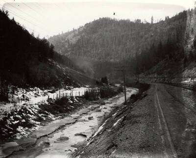 The Coeur d'Alene River near Wallace, Idaho. Taken for H.L. Day.