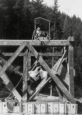 Men working with a hoist at the mine on Rock Creek, west of Mullan, Idaho.