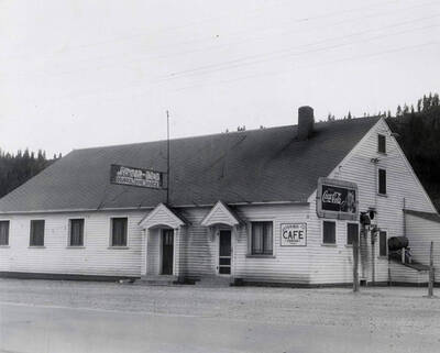 View the Jitter-Bug Cafe and Nightclub in Osburn, Idaho. A real estate view taken for Idaho First National Bank.