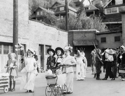 Children walking in the Elks Roundup parade in Wallace, Idaho.