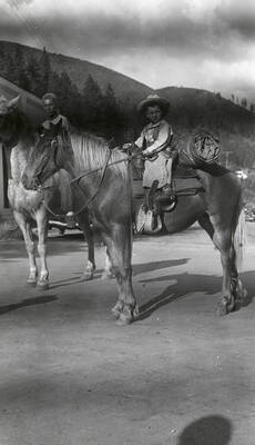 Children dressed up and riding horses for the children's parade during Mullan 49'er parade in Mullan, Idaho.