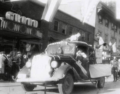 A few boys riding on a float during the Eagles parade in Wallace, Idaho.