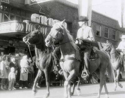 Men riding horses in the Eagles parade in Wallace, Idaho.