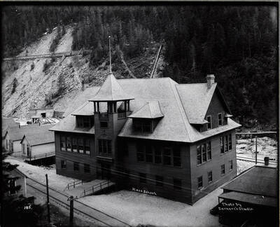 Exterior image of the Mace School and surrounding buildings. Caption from front: Mace School.