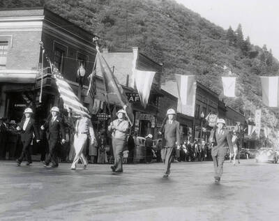 A group dressed up and marching in the Eagles parade in Wallace, Idaho.