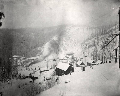 View of the buildings on the mine covered in snow.