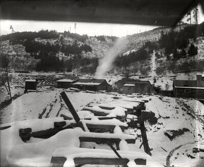 Buildings covered in snow on Stewart Mine in Wallace, Idaho.