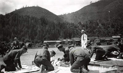 The members of Hecla #1 team performing first aid at the first aid contest in Mullan, Idaho.