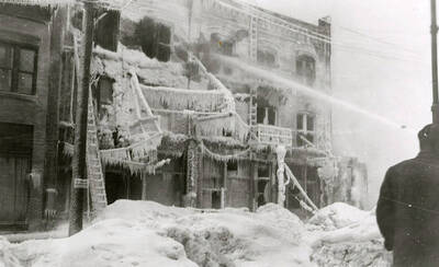The fire being put out at the Ryan Hotel on Cedar Street in Wallace, Idaho.