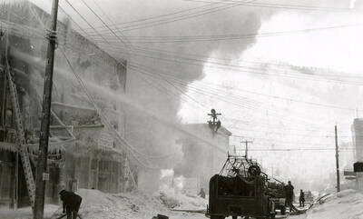 The fire being put out at the Ryan Hotel on Cedar Street in Wallace, Idaho.