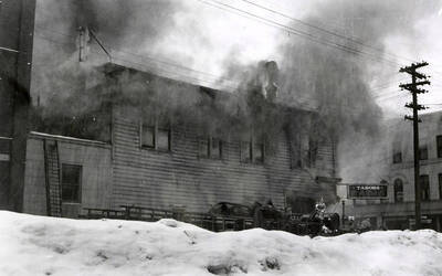 View of the fire at Tabor's Radio store in Wallace, Idaho.