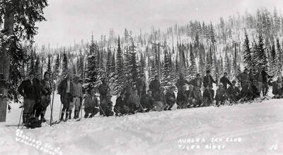 The Aurora Ski Club and Wallace Men standing together in ski gear at Tiger Ridge.