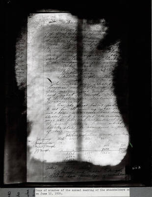 Largely illegible photograph of meeting minutes from a Murphy Lucas Clothing Co. stockholder's meeting. This document names J.J. Murphy, Mabel Murphy, John Lucas and Josephine Lucas as stockholders.