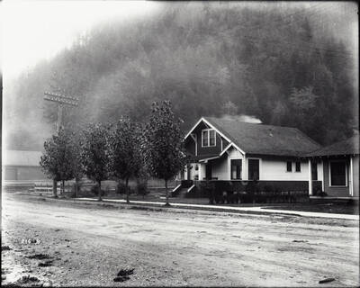 Angled view of the exterior of the Dr. Charles Mowery residence in Wallace, Idaho.