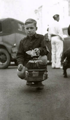 A boy with his pet at the Veterans pet parade in Wallace, Idaho.