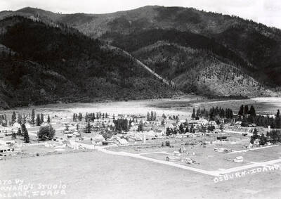 View of Osburn, Idaho. A mountain can seen in the distance.