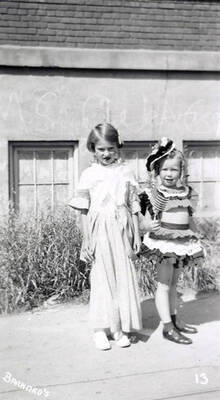Two girls in costume for the Mullan 49'er parade in Mullan, Idaho.