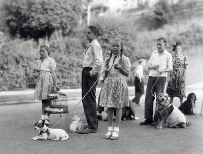 Children in costume with their pets during the Slippery Gulch parade in Wallace, Idaho.