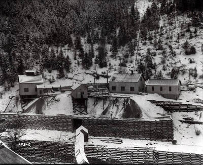 Snow-covered, exterior view of lower tunnel no. 5 at the Hercules Mine in Burke, Idaho.