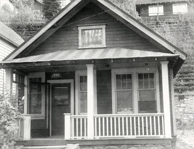 Exterior view of the house at 718 residence Street in Wallace, Idaho. Taken for J.A. Peterson Agency.