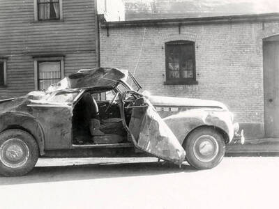 The wrecked automobile of Dean Sims of Winnet, Montana.