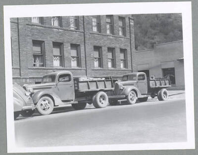 Trucks with first shipment of ore from Silver Cable Mine.