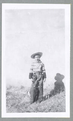 Children in costume walking along during the Children's Parade.