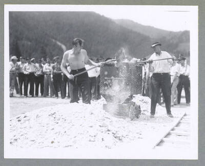 Two girls in matching costumes posing for a photograph during the Children's Parade.