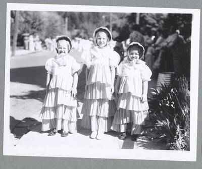 Children in costume walking along during the Children's Parade.