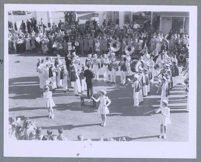 A band playing on the back of a truck with a sign that reads, "Mary's Place" during the Elks Roundup Parade in Wallace, Idaho.