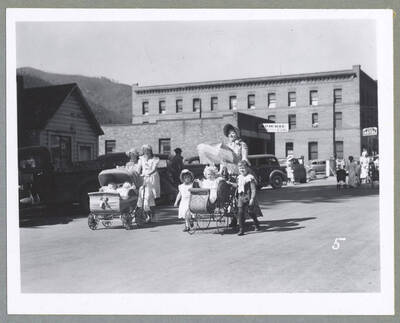 A little girl wearing a derby hat during the Children's Parade.