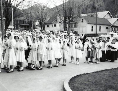 Children participating in the crowning of Virgin Mary at Our Lady of Lourdes Academy in Wallace, Idaho.